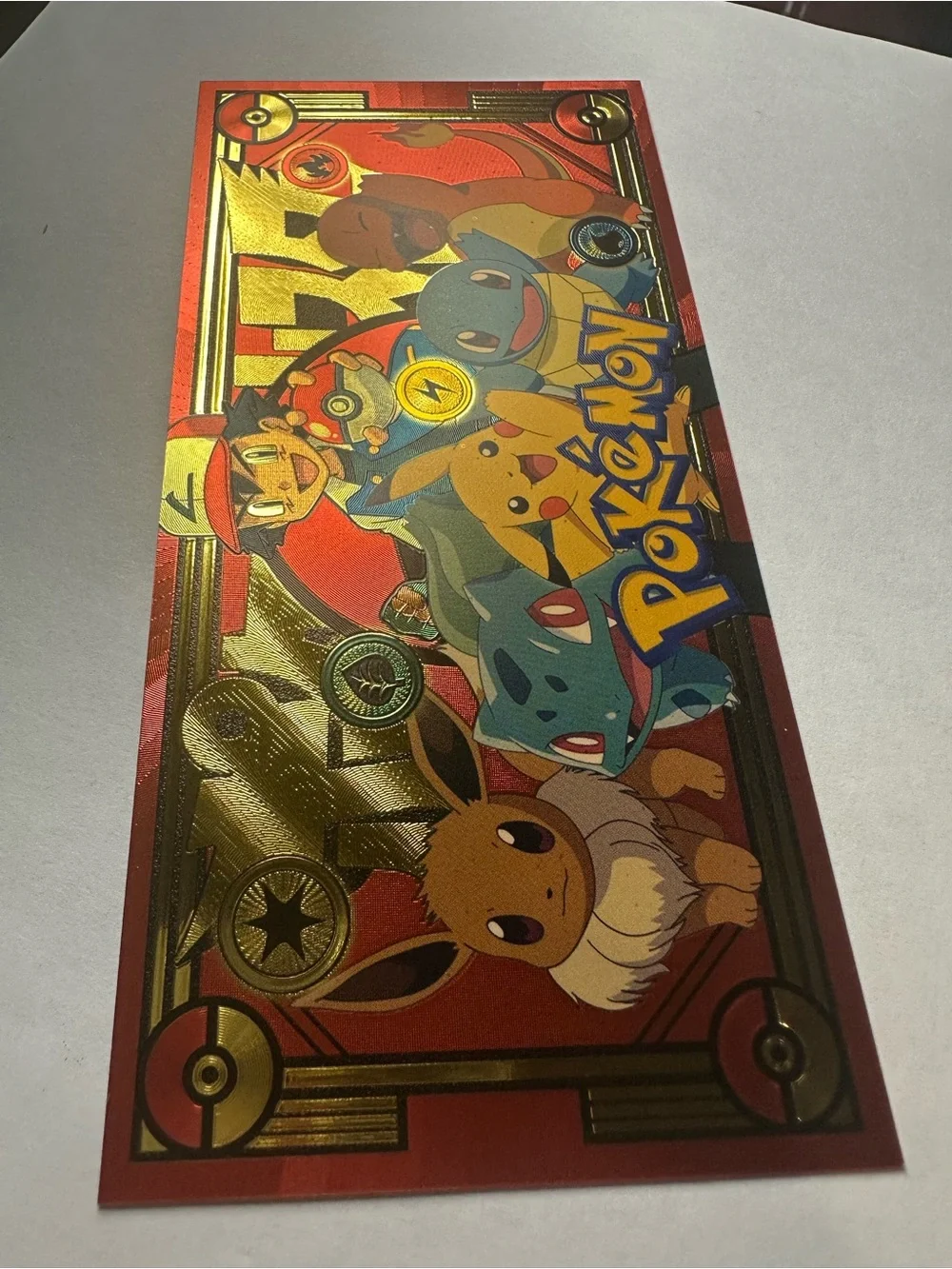 Pokémon Gold Foil Collectible Banknote Pikachu Charizard Eevee Ash 1996